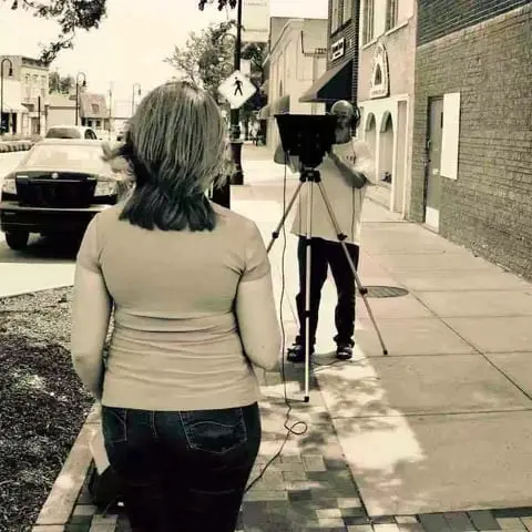 Actress Sarah Klopp filming the news reporter scene for the Apparition movie trailer on location in Council Bluffs Iowa